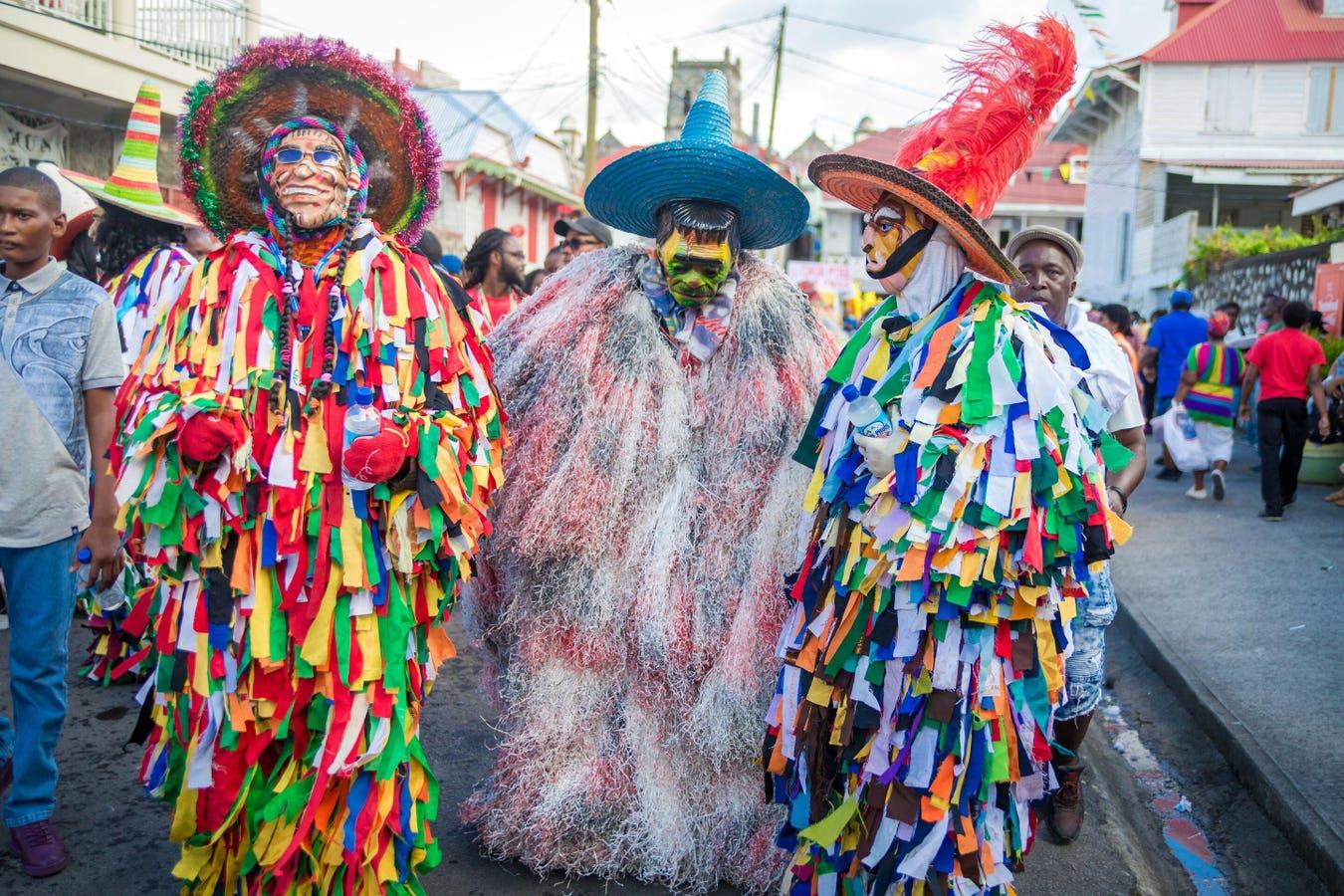 Mas Domnik carnival revellers in full costume